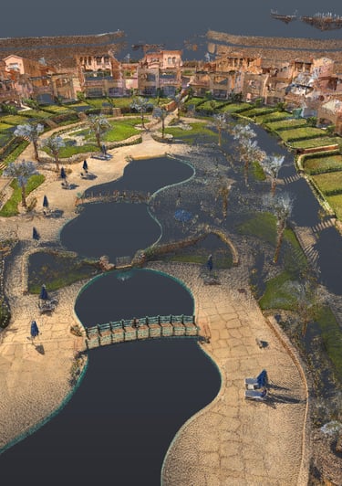 Aerial 3D model of a luxury resort complex featuring villas, green lawns, and a central water park.