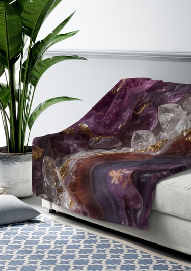 a purple blanket on a settee