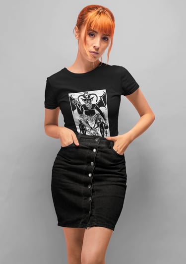a woman in a black top with a black and white photo of the devil tarot