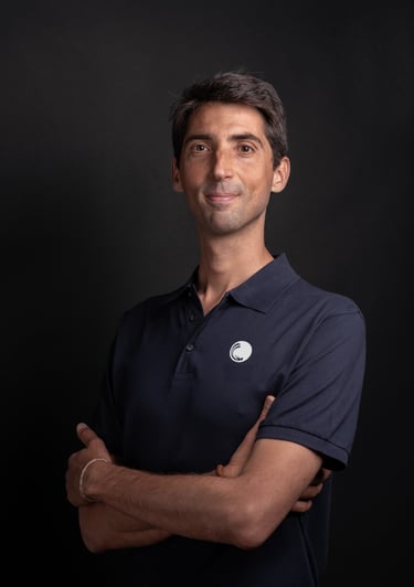 a man in a blue shirt and a white shirt