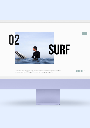 a computer screen showing a surfer in the water