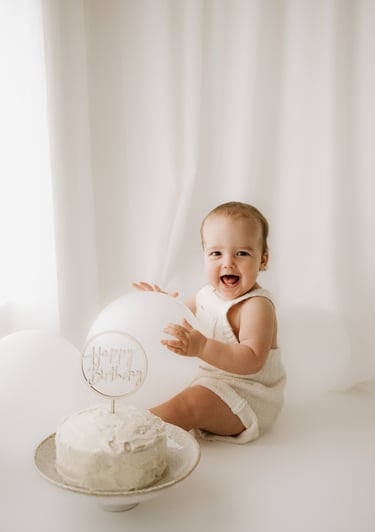 toddler with his 1st birthday cake in Adelaide Hills studio