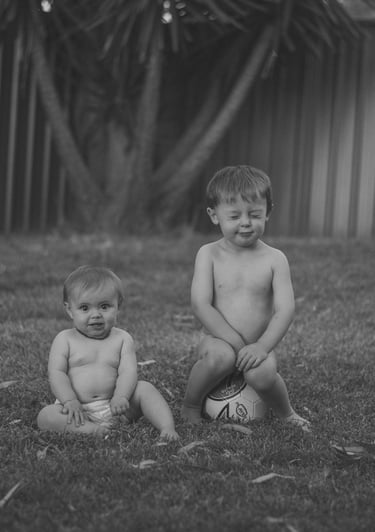 brother & sister in backyard ina lifestyle photo session in Adelaide Hills