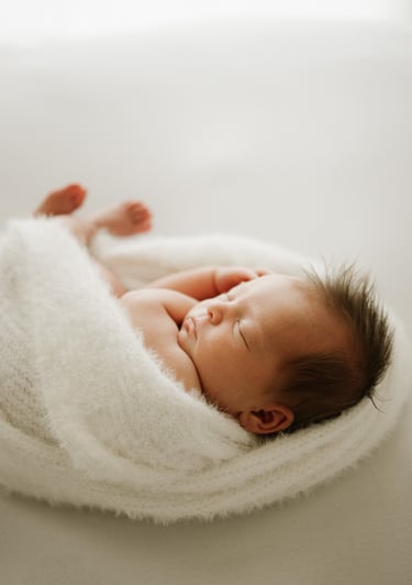 newborn sleeping photographed in natural light studio Littlehampton