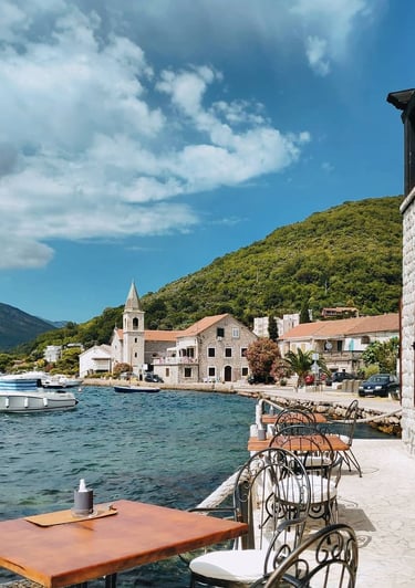 a table with a table and chairs in front of a building