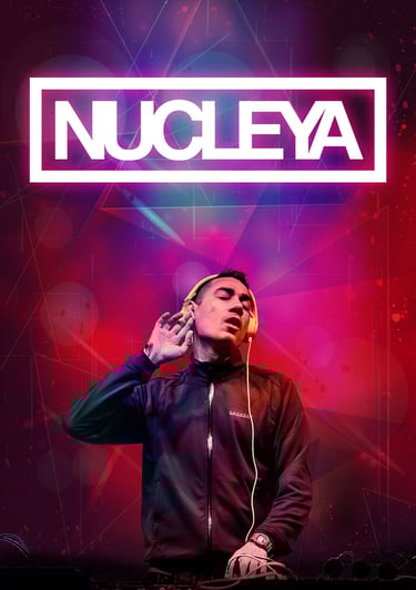 a man in a black jacket and headphones on a dj set