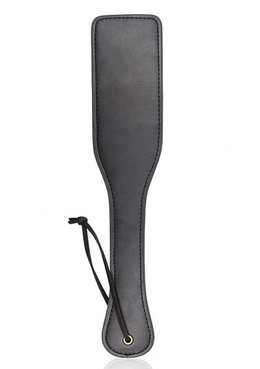 a faux leather paddle for bdsm play