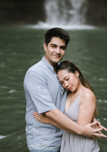 Romantic prewedding embrace at Tibumana Waterfall Bangli Bali