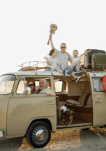 Retro roadtrip inspired family photography session with vintage combi van at Melasti Beach Bali