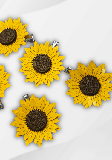 LYSENN PARIS a group of yellow sunflowers on a white surface