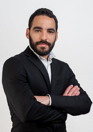 a man in a suit and a white shirt