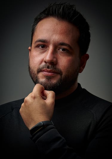 a man with a beard and a black shirt
