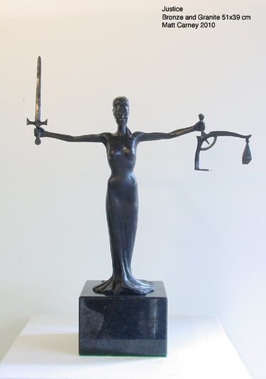 a statue of a lady justice 