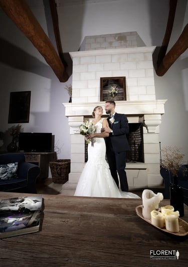 weeding photographer florent lille saint omer bride and groom standing in a room with candles