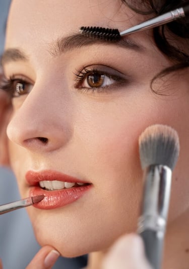 a woman is getting ready to be a make - up