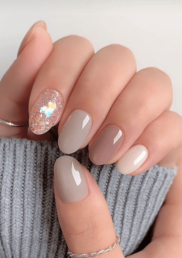 a woman's hand painted manicured manicured manicured manicures