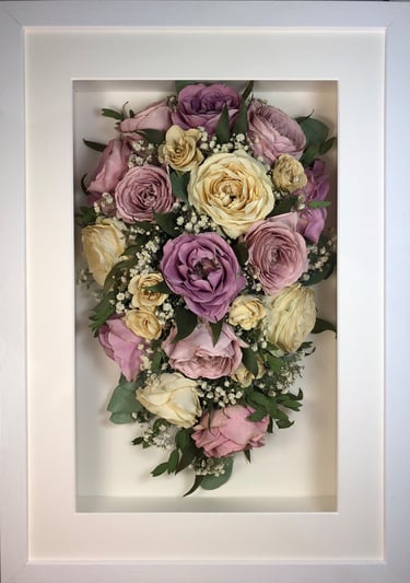 purple and ivory trailing view preserved wedding bouquet in a frame