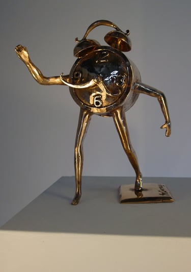 a bronze clock with legs and arms stepping off the base