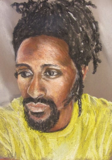 Portrait of a man, looking pensive and wistful, taken from a photograph, drawn in soft pastel