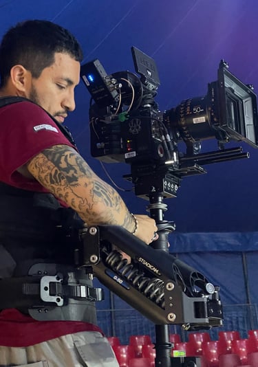 Jonathan Calero operating steadicam and RED camera