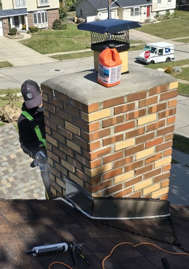"Structural repair of a brick chimney by Profaster Services in Des Moines."