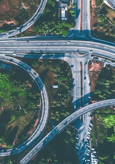 Aerial view of highway interchange with greenery