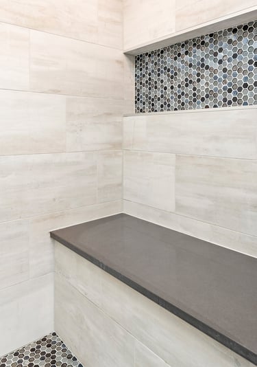 Contemporary bathroom renovation in Cumming, GA with dual sinks and modern design"