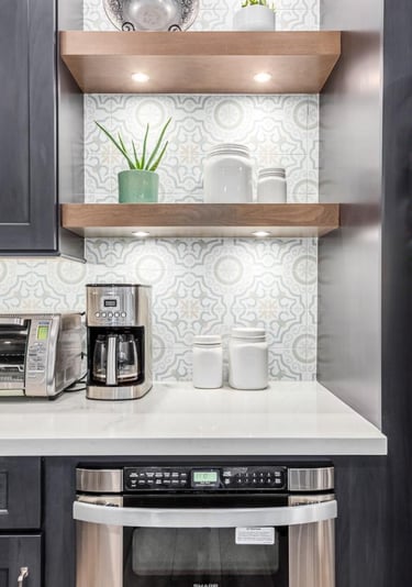 Bright kitchen design with durable quartz countertops and premium stainless steel appliances