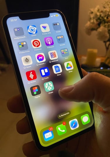 a person holding a phone with a phone in their hand with ohaio app on it