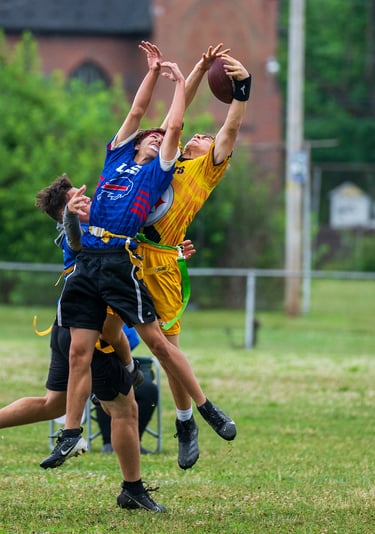 a group of people playing flag football