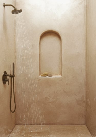 a shower with a shower head and a shower head