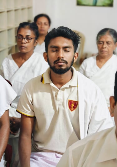 a man with a beard and a beard sitting in a chair