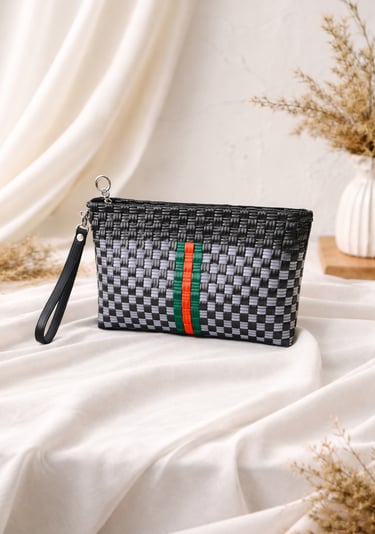 Handmade woven plastic clutch bag black and grey with green red stripe accent by Craftvitas Indonesia