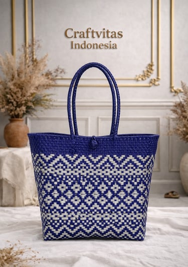 Handwoven plastic tote bag with Indonesian ethnic batik pattern in blue and white, sustainable handmade bag