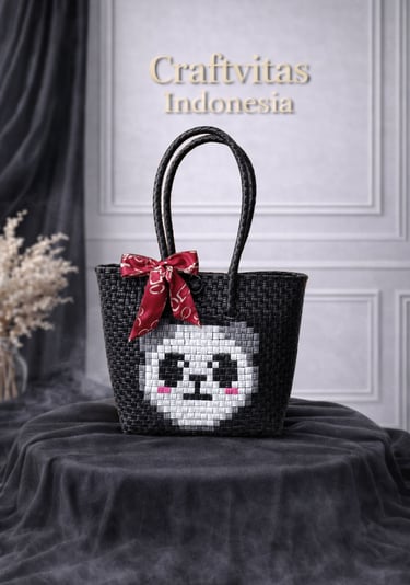 Cute black handwoven plastic tote bag with character pattern, handmade recycled plastic bag