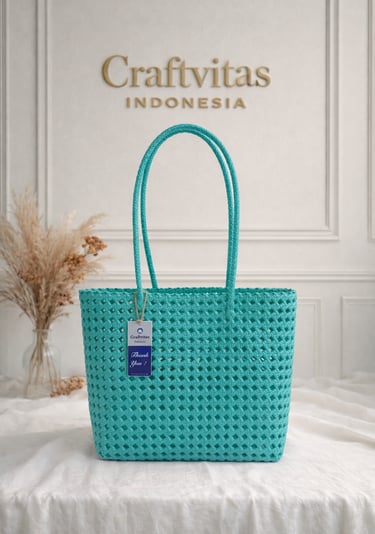 Turquoise handmade woven plastic tote bag Sekar series, eco friendly recycled artisan handbag