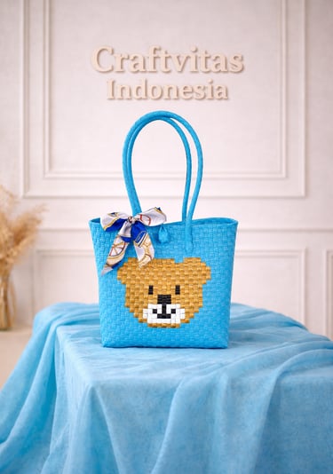 Light blue handwoven plastic tote bag with bear character, handmade recycled plastic bag