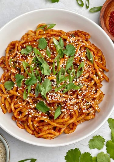 a bowl of noodles with Chili Oil