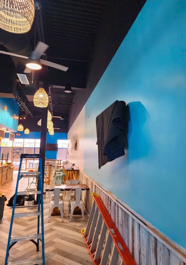 Commercial space with vibrant blue wall painting by Mont Sião Painting in Hartford, Connecticut. Smo