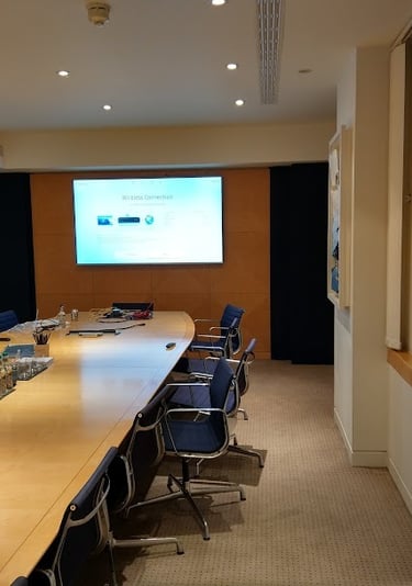 Professional large screen mounting and conference tech for a corporate London office