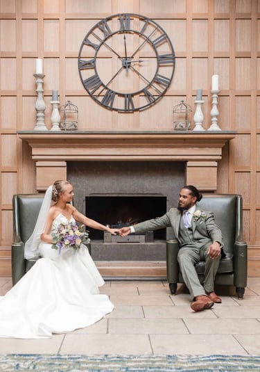 Newly weds hold hands in a beautiful wedding portrait