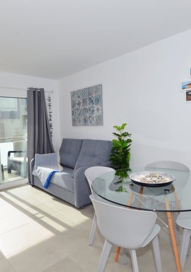 Foto de el salón de un apartamento en alquiler vacacional en Corralejo Fuerteventura