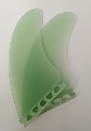 a green plastic surfboard fin fin fin fin fin fin fin fin fin fin fin
