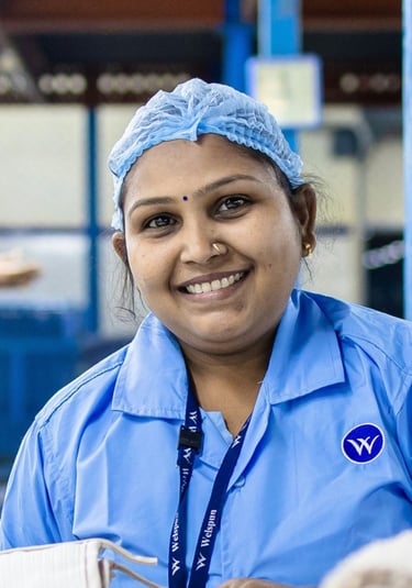Warehouse employee smiling 