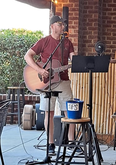 William Finn from Finn's Echo performing in front of live audience