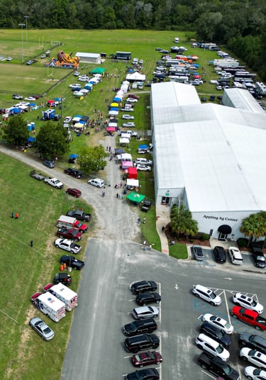 a large field with many cars parked in it
