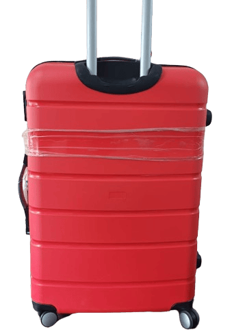 a red fiber suitcase trolley with black handle 