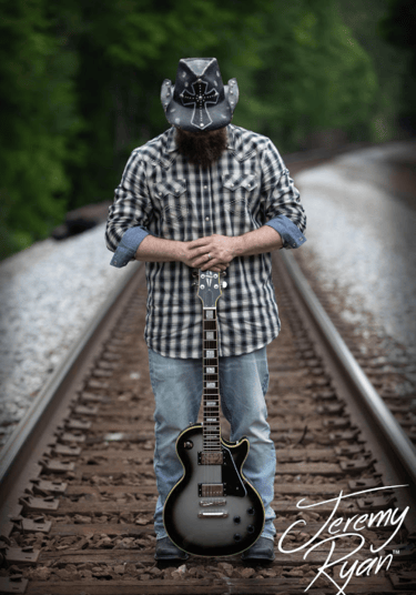 a man with a guitar and a guitar