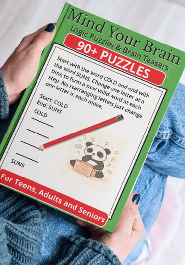 A person holding a Mind Your Brain logic puzzles book for adults with a word ladder brain teaser.