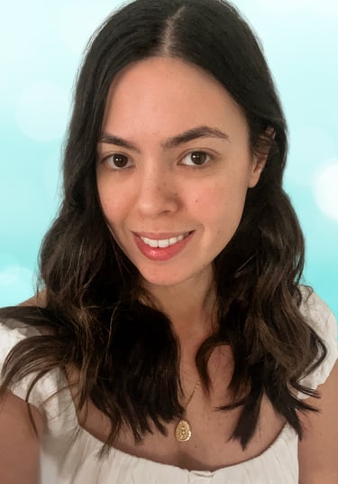 a woman with long hair and a white dress